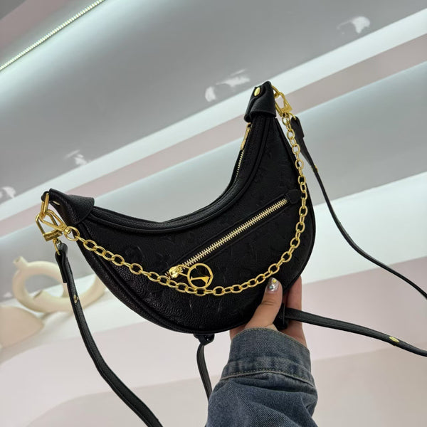 VL Monogram Crescent Shoulder Bag